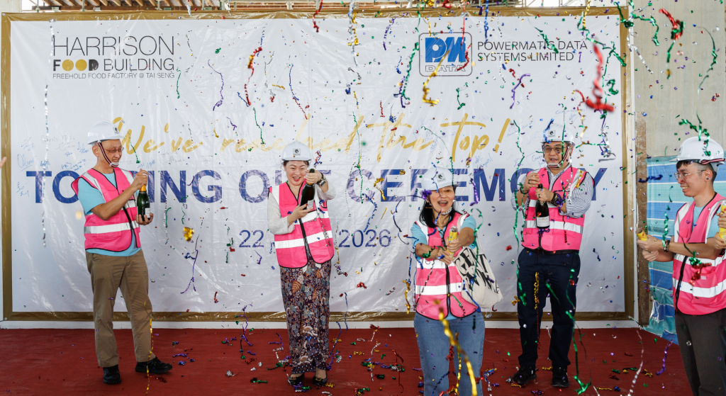 Champagne toast during Harrison Food Building topping-out ceremony